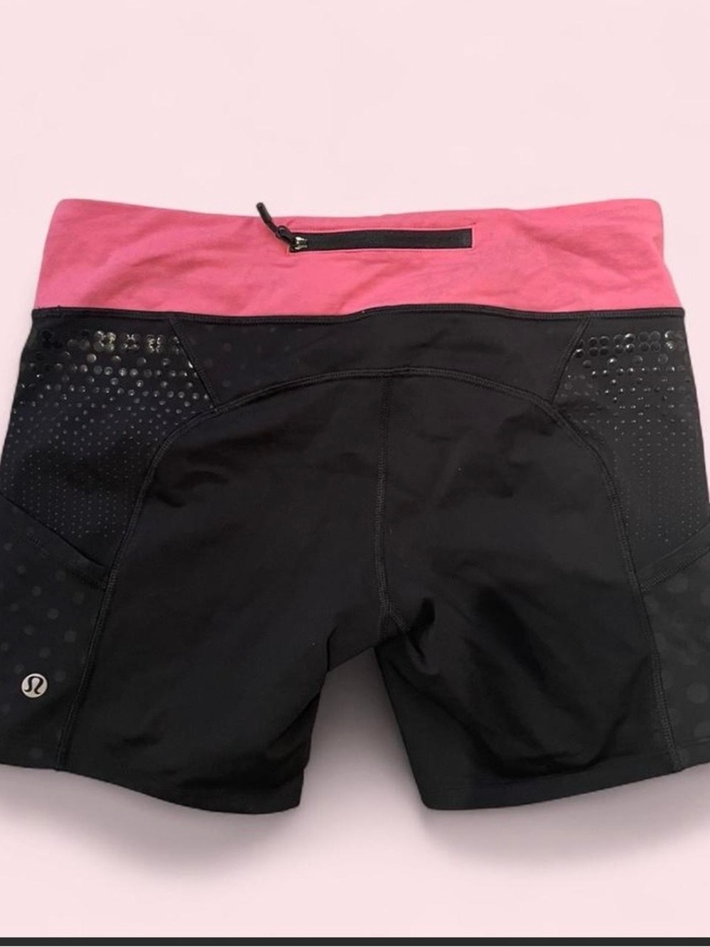 Lululemon women’s black and pink shorts with pockets in size 10